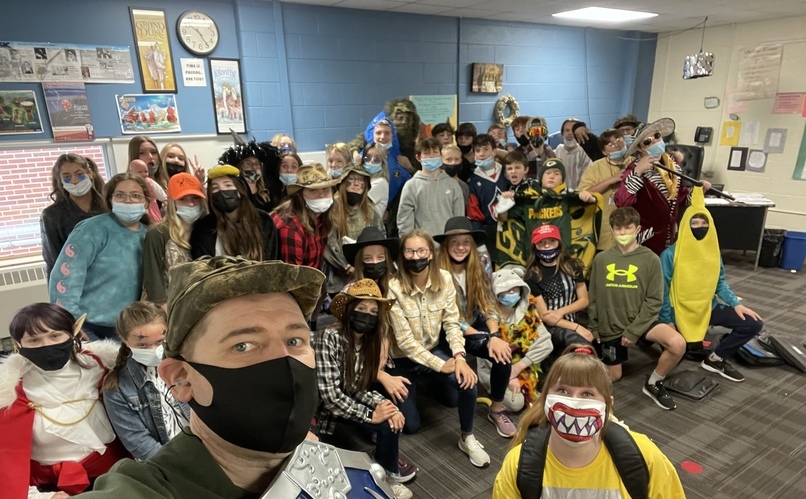 Students and staff dressed in Halloween costumes